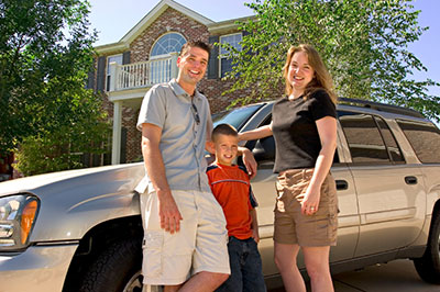 Family with family vehicle